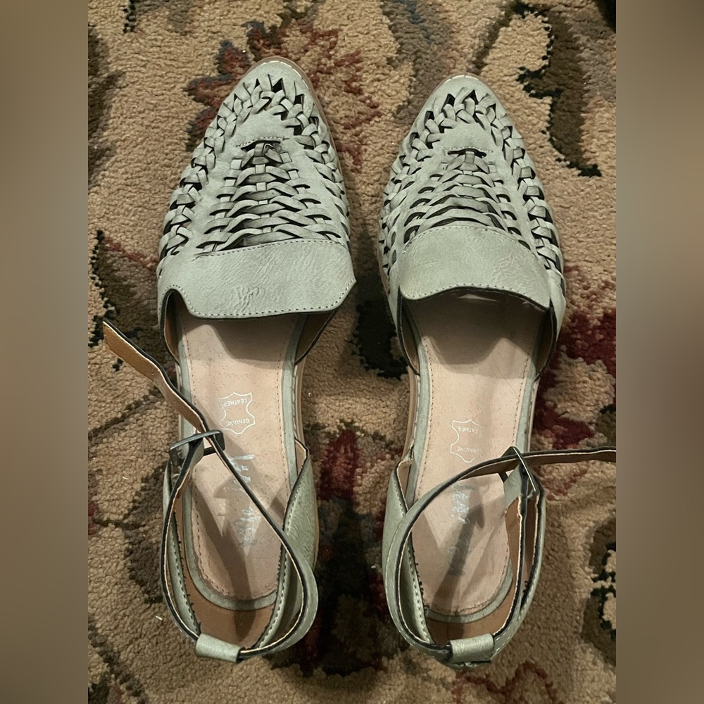 Light pastel green,  buckle around the ankle
